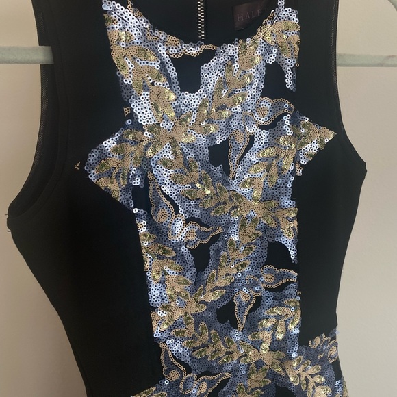 Mid length form fitting dress with sequenced detailed panel down front - Picture 2 of 3